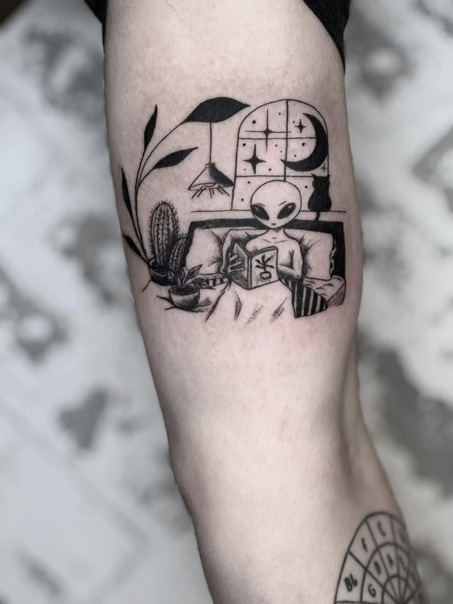 Alien reading a book blackwork