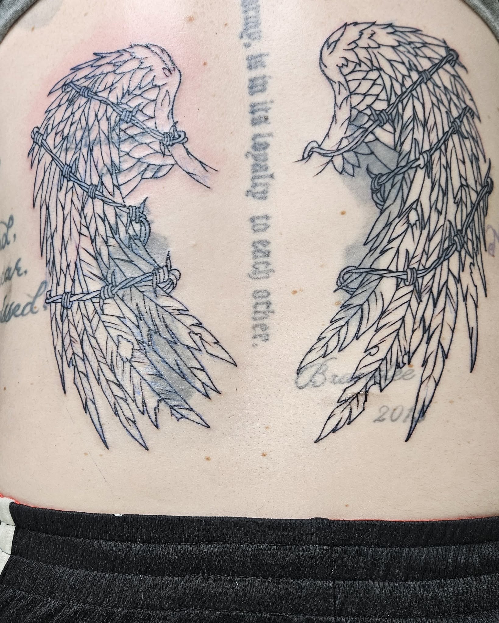 Angel wings tattoo
