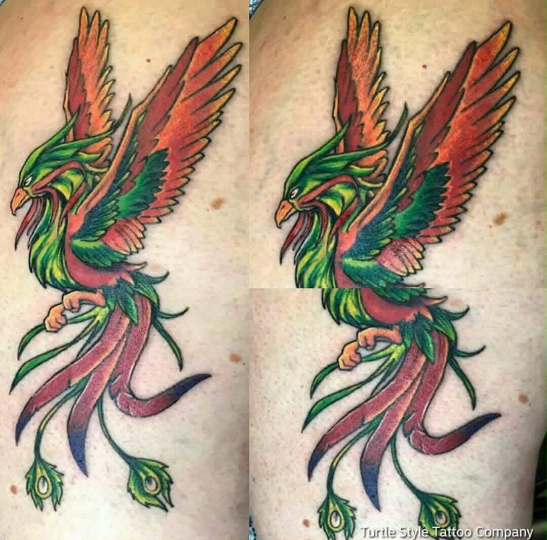 Colorful green and red phoenix tattoo