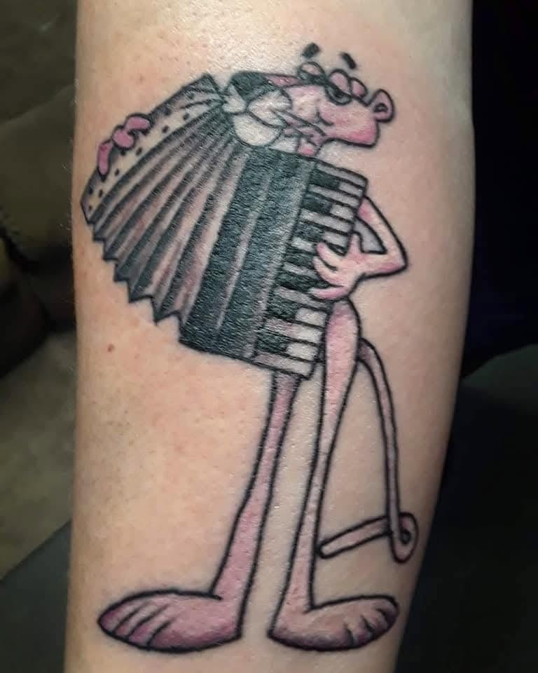 Pink Panther playing accordion