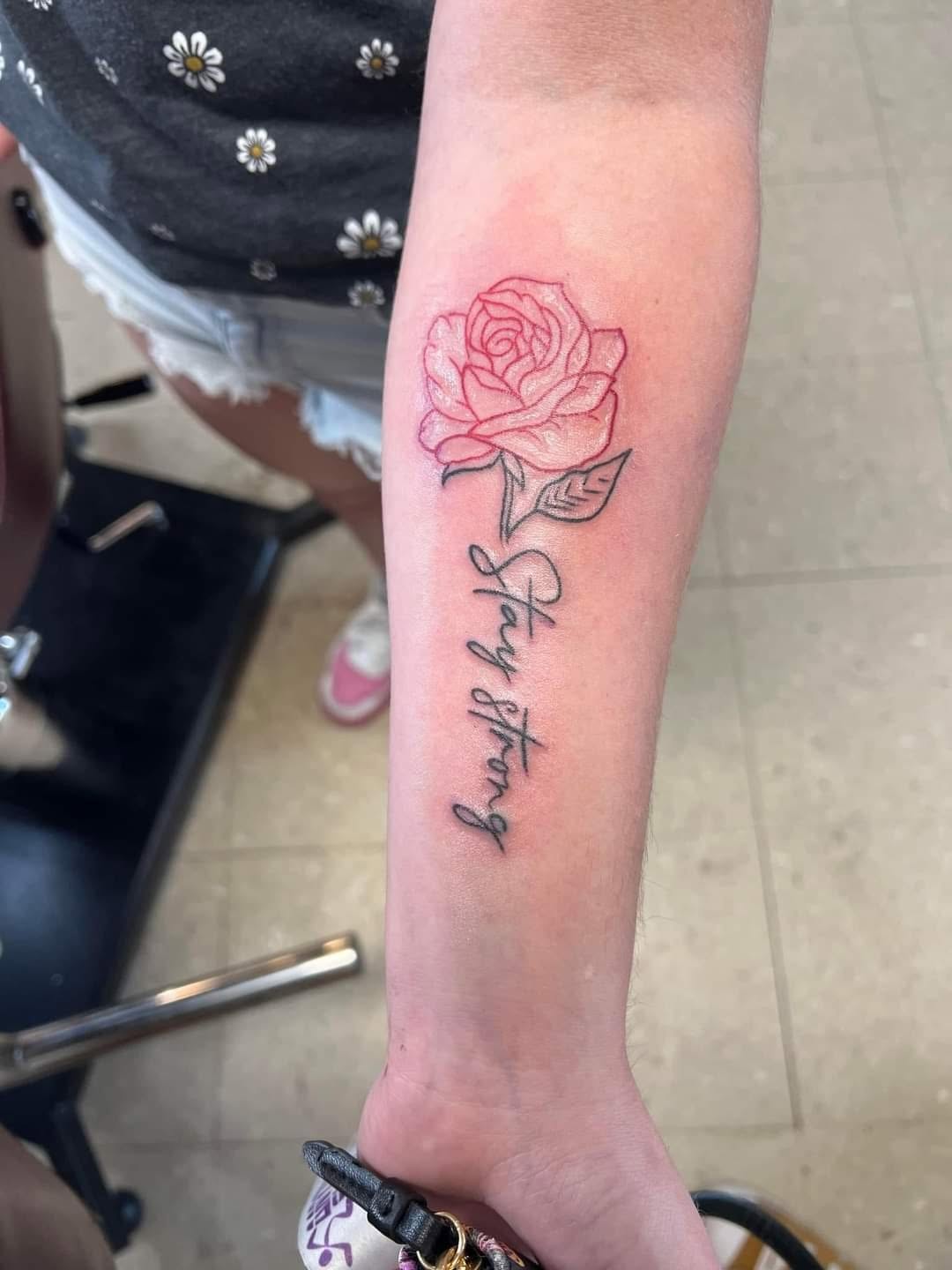 Rose with stay strong script forearm