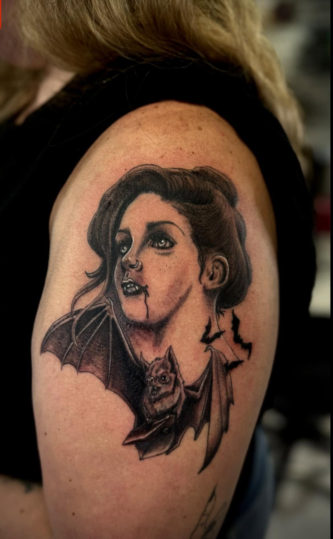 Vampire woman portrait with bat